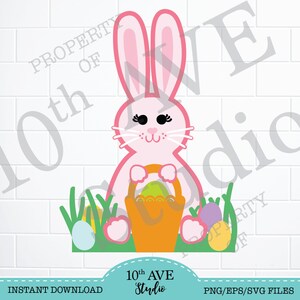 May include: A pink bunny rabbit holding a basket of Easter eggs. The bunny is sitting in a patch of green grass with more eggs around it.