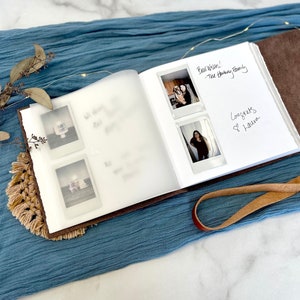 Personalized Leather photo albums have paper pages that you can not only put photos on but write on them.  Whether you use this as a photo album or guest book or both, it's thick pages look elegant with photos and an your personalized writing.