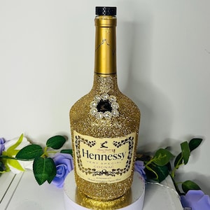 Gold Hennessy bottle