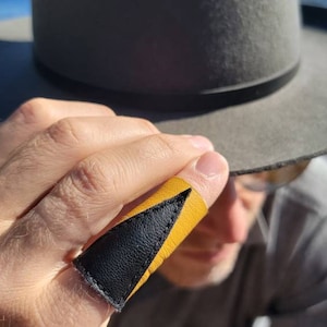 THREE WOMEN geometric black and yellow vegan stretch leather unisex statement ring