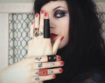 THE VOID convertible black vegan leather stretchy statement ring