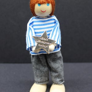 Gold star enamel pin attached to a doll’s jacket, showing playful scale. Humour badge for work stress or neurodivergent support gift, funny enamel pin for adults, sarcastic motivational reward.