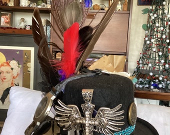 The angels are here to guide you, with this different and unique, mini steam punk hat