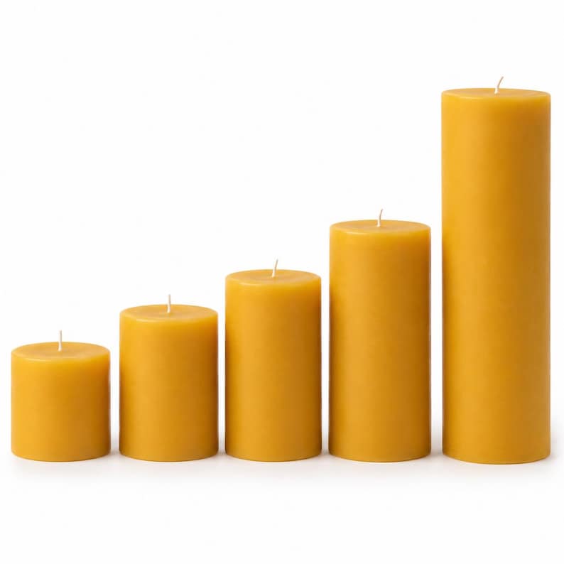May include: Five yellow pillar candles of varying heights are arranged in a row. The candles are cylindrical with a smooth surface and a wick at the top. The tallest candle is approximately 8 inches tall, while the shortest is about 3 inches.