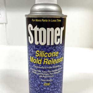 May include: A blue and yellow can of Stoner Silicone Mold Release, a food-grade product that prevents parts from sticking. It provides fast, easy part removal from molds and multiple part releases per application. The can is 12 ounces (341 grams).