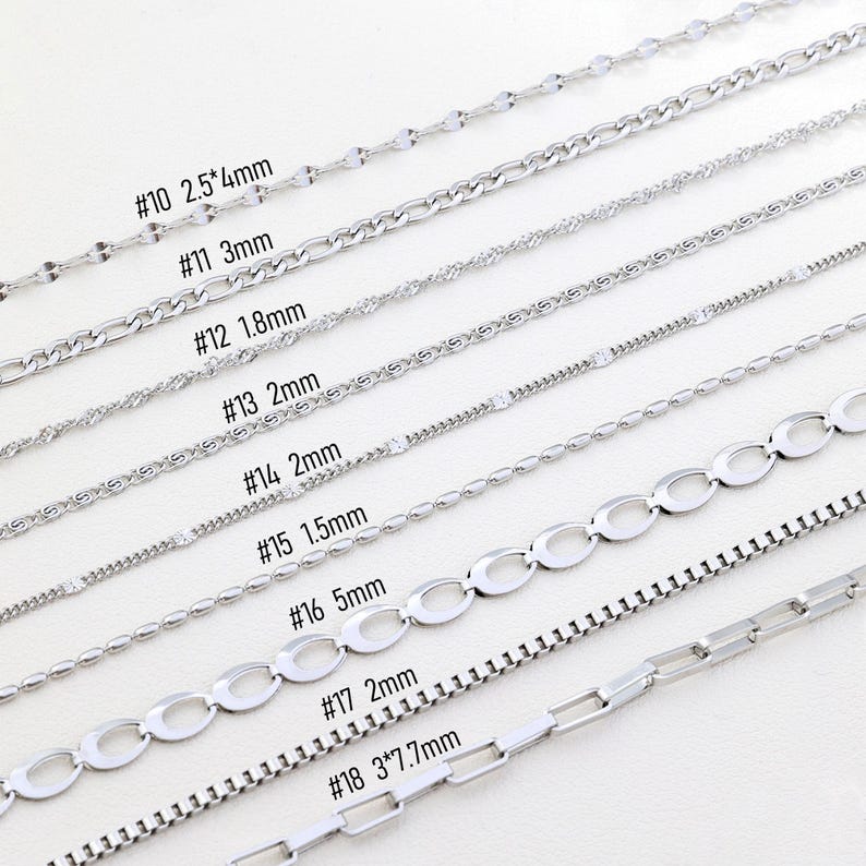 May include: A collection of silver-colored chain necklaces in various styles. The image displays different chain designs, including oval links, box chains, and beaded styles. Each chain is labeled with a number and measurement, such as "#10 2.5*4mm".