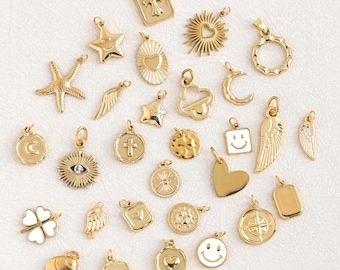 Zawieszka ze złota, zawieszka w kształcie serca, zawieszka w kształcie gwiazdy, słońca i księżyca, zawieszka w kształcie skrzydła, zawieszka w kształcie krzyża, zawieszka w kształcie czterolistnej koniczyny, zawieszka ze stali nierdzewnej