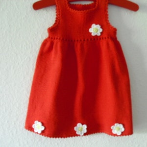 Knitted baby dress image 1