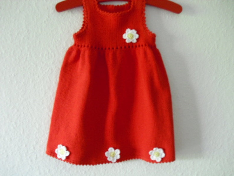 Knitted baby dress image 1