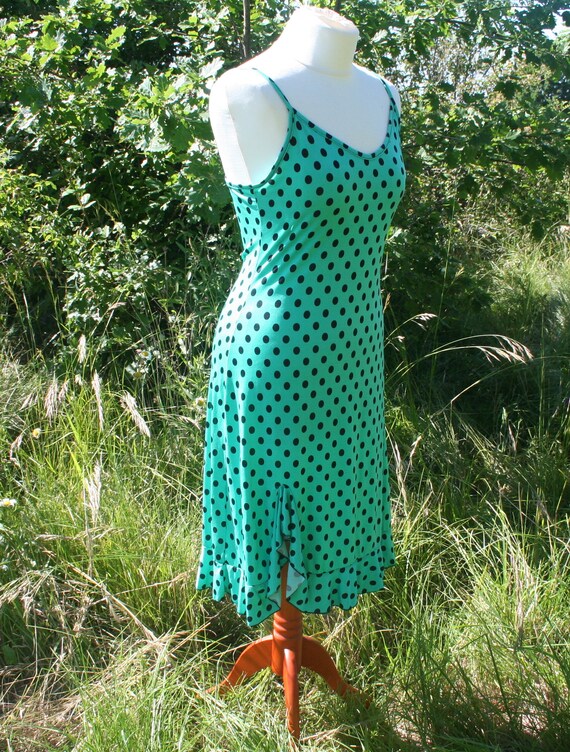 green dress with black polka dots