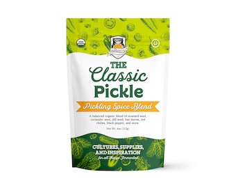 May include: A white pouch with green and yellow accents, labeled "The Classic Pickle Pickling Spice Blend." The packaging includes text about the organic blend of spices and the net weight of 4 oz (113g).