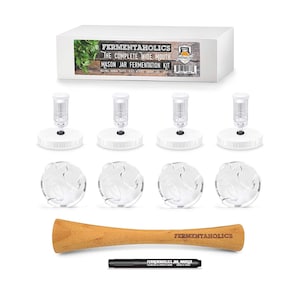 May include: A complete wide mouth mason jar fermentation kit. The kit includes a box with the text "Fermentaholics", four airlocks, four glass weights, a wooden tamper, and a marker. The kit is designed for home fermentation projects.