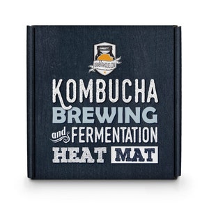 May include: A dark blue box with the text "Kombucha Brewing and Fermentation Heat Mat" in white lettering. The box has a small logo of a jar with the text "fermentatholics.com" in white lettering.