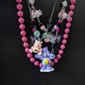 HardcoRe Care BeaR CHAOS necklace set by Daysela. Purple Care Bear. Retro Care Bear Creations. 1980s American Greetings Care Bears.
