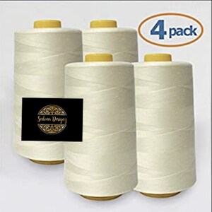 May include: Four spools of white thread, each with a yellow top, labeled "Selena Designs". The spools are arranged in a row, with the label facing the viewer. The image includes the text "4 pack".
