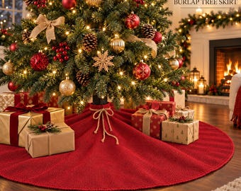 May include: A 60-inch red burlap tree skirt featuring a circular design with a central opening and a tied jute rope closure. The fabric has a textured weave and is positioned at the base of a decorated Christmas tree with gifts.