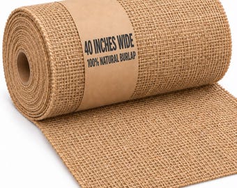 May include: A roll of tan, woven burlap fabric with a visible grid texture. A brown paper label is wrapped around the center, featuring the black printed text 40 INCHES WIDE and 100% NATURAL BURLAP. The fabric is unrolled at the bottom edge.