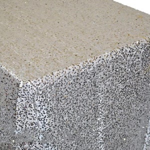 May include: A silver sequin tablecloth with a subtle shimmer. The tablecloth is made of a soft, luxurious fabric and is perfect for adding a touch of glamour to any event.