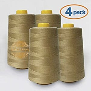 May include: Four spools of beige sewing thread, each with a yellow top, labeled "4 pack".