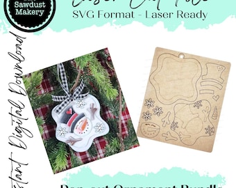 May include: A digital download SVG file for a laser cut pop-out snowman ornament. The file includes the snowman's body, hat, carrot nose, and snowflakes. The image shows a finished ornament and the laser cut file.