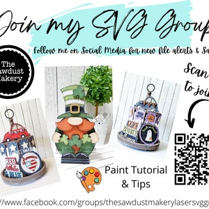 May include: Join a SVG group on Facebook by scanning the QR code. The image shows a variety of painted wooden crafts, including a leprechaun, a tiered tray with a red car, and a tiered tray with Halloween decorations. The text "The Sawdust Makery" is visible on the image.