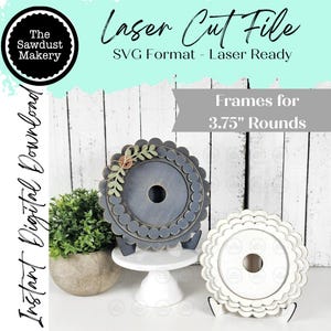 May include: Two laser-cut wooden frames for 3.75-inch rounds. One frame is painted gray and decorated with a floral accent. The other frame is white. The text "Laser Cut File" and "Frames for 3.75" Rounds" are visible.
