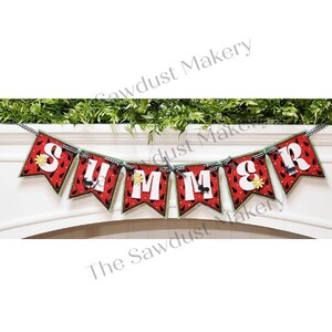 May include: A decorative banner spelling "SUMMER" with watermelon-themed pennants. Each red pennant features black seeds and white accents, with a green border. The letters are white, and the banner is strung with a black and white checkered ribbon.