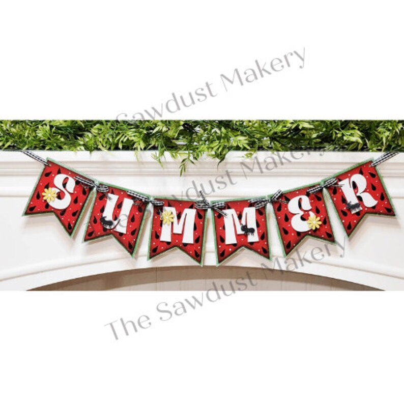 May include: A decorative banner spelling "SUMMER" with watermelon-themed pennants. Each red pennant features black seeds and white accents, with a green border. The letters are white, and the banner is strung with a black and white checkered ribbon.