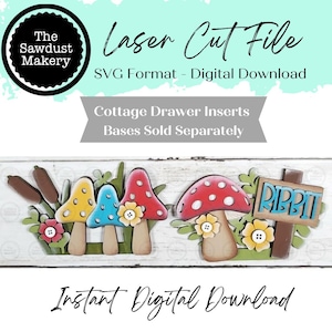 May include: A colorful laser cut file design featuring whimsical mushrooms and a sign that says "Ribbit". The design includes yellow, blue, and red mushrooms with flower accents. The text "Instant Digital Download" is also visible.