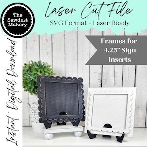 May include: Two laser cut frames with scalloped edges and a stand. The frames are 4.25 inches and are ready to be used for signs. One frame is black and the other is white.
