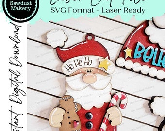 May include: A laser cut file for a Santa Claus ornament featuring a gingerbread man and a candy cane. The ornament is red, white and brown with a glitter finish. The text "Ho Ho Ho" is written on the ornament. The file is in SVG format and is laser ready.