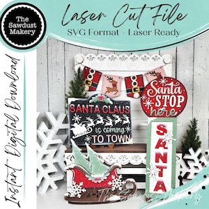 May include: A digital laser cut file set featuring Christmas-themed wooden decorations including a Santa sleigh, a Santa Stop Here sign, a Santa Claus is coming to town sign, a vertical Santa sign, and a banner with reindeer and Santa suit motifs.