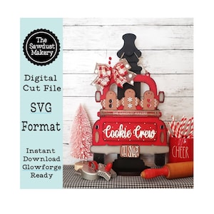 May include: Red truck with a black silhouette of a Christmas tree on top, carrying three gingerbread men. The truck has the words "Cookie Crew" on the back and "Oh Snap!" on the bottom.