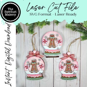 May include: Three pink Christmas ornaments with gingerbread men inside snow globes. Each ornament has a red and white striped bow and a twine hanger. The text "Laser Cut File" and "Instant Digital Download" are visible.