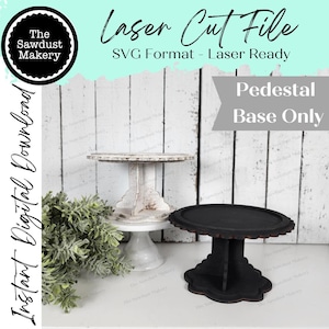May include: Two decorative pedestal bases, one white and one black, are displayed. The white base has a distressed finish, while the black base has a scalloped edge. Text on the image reads "Laser Cut File" and "Pedestal Base Only."