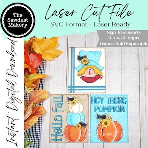May include: Three rectangular signs measuring 12.7 cm by 15.88 cm featuring laser cut designs. One sign shows a scarecrow, one says Hello Fall with stacked pumpkins, and one says Hey There Pumpkin with a single pumpkin and floral accents.