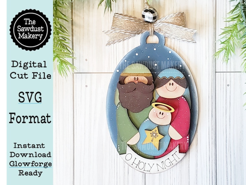 May include: A wooden Christmas ornament featuring a blue and white oval with a depiction of the Holy Family. The ornament is decorated with snowflakes and the text "O HOLY NIGHT".