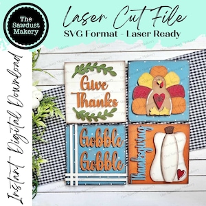 May include: Four wooden signs with Thanksgiving themes. The signs are blue, orange, and white with white polka dots. The signs say "Give Thanks", "Gobble Gobble", "Thanksgiving", and a turkey with the words "Gobble 'til you wobble".