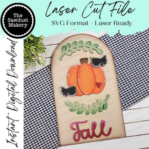 May include: A laser cut file for a fall-themed sign featuring a pumpkin, leaves, and the word "Fall". The file is in SVG format and is ready to be used with a laser cutter.