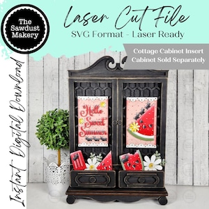 May include: A black wooden cabinet with two drawers and two doors, featuring laser-cut designs. The doors display watermelon and floral artwork. Text on the image reads "Laser Cut File" and "Hello Sweet Summer". The Sawdust Makery logo is visible.