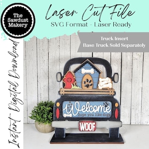 May include: A laser-cut wooden truck insert with a dog theme. The truck bed says "Welcome, hope you like dogs" and "Woof." The truck features a dog house, fire hydrant, and bone accents. The text "Laser Cut File" and "Instant Digital Download" are also visible.