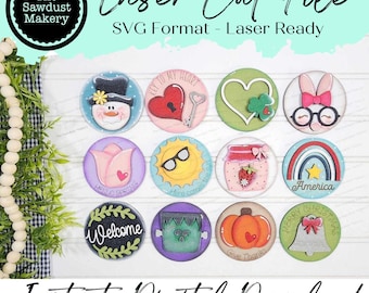 May include: Twelve round wooden signs with various designs, including a snowman, a heart with a key, a rainbow, a pumpkin, and a welcome sign. The signs are all laser cut and ready to be painted.