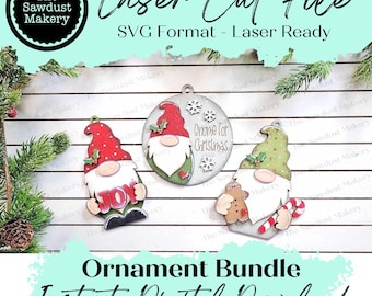 May include: A set of three Christmas gnome ornaments for laser cutting. The ornaments feature a gnome with a red hat, a gnome with a green hat, and a round gnome with a white background and the text "Gnome for Christmas".
