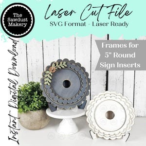 May include: Two laser-cut wooden frames for 5-inch round sign inserts. One frame is gray with a floral accent, the other is white. The image includes text: "Laser Cut File" and "Frames for 5" Round Sign Inserts."