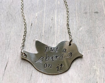 Hand stamped 'put a bird on it' necklace on bird blank. Portlandia.