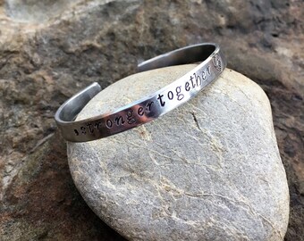 Hand Stamped '#strongertogether' cuff bracelet. Proceeds to Planned Parenthood. Hillary Clinton, hashtag strongertogether, nasty women.