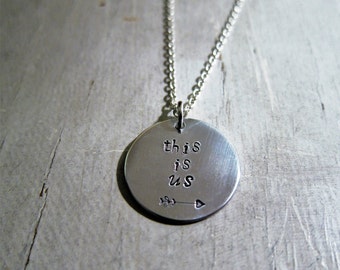 Pendant 'this is us' hand stamped necklace. Featuring arrow heart. Love wins.