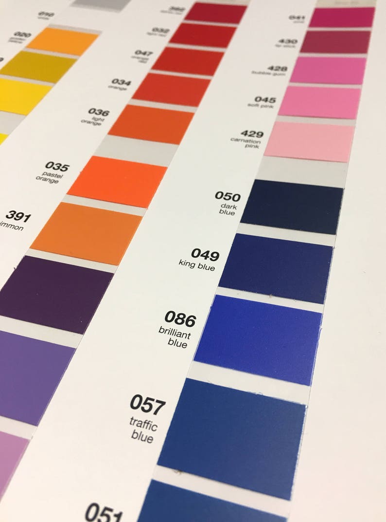 May include: A color chart with numbered color swatches in various shades of orange, red, pink, and blue. The chart includes color names like "pastel orange", "dark blue", and "brilliant blue". The swatches are arranged in vertical columns.