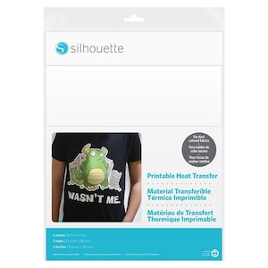 May include: A package of printable heat transfer material for dark colored fabrics. The package shows a black t-shirt with a green monster graphic that says "Wasn't Me."
