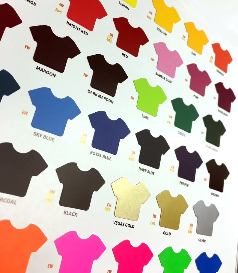 May include: A color chart of t-shirt colors, displayed as t-shirt shapes. The colors include: orange, lemon, yellow, bright red, red, bubble gum, maroon, dark maroon, sky blue, royal blue, navy blue, green, purple, brown, charcoal, black, Vegas gold, gold, silver, pink, lime, and neon green.